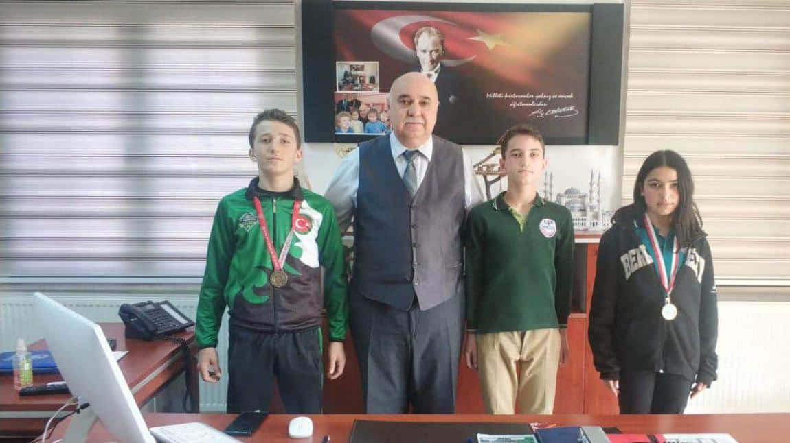 Gurur Kaynağı sporcumuz Hamza KAMBUR'dan  İlçe Milli Eğitim Müdürü Ercan Gültekin' e Ziyaret